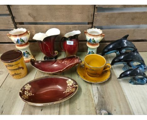 A selection of collectables; Carlton ware rouge Royale, Royal Worcester Palissy ware &amp; five Poole pottery dolphin figures