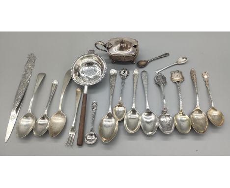 A Collection of silver items; Indian silver paper knife, Birmingham silver four foot condiment pot, Birmingham silver tea str