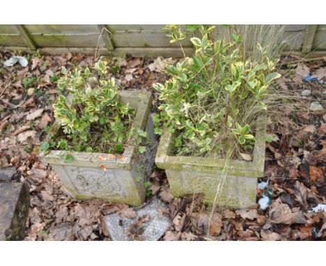 A PAIR OF MODERN COMPOSITE SQUARE GARDEN PLANTERS with Celtic panels to each face, 31cm cubed