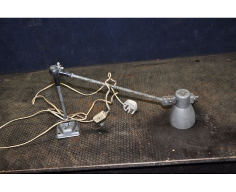 A VINTAGE INDUSTRIAL ARTICULATED INSPECTION LAMP with textures silver finish, a single joint and adjustable shade (PAT fail d