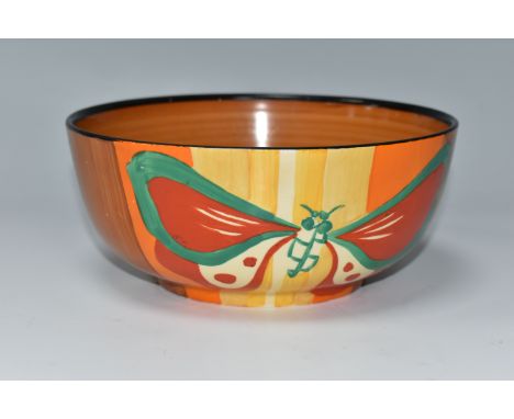 A CLARICE CLIFF FANTASQUE 'BUTTERFLY' PATTERN BOWL, the exterior painted with brightly coloured butterflies on a stripy yello