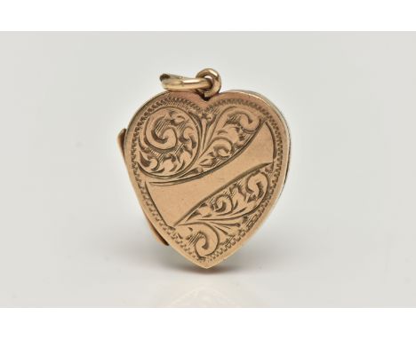 A 9CT GOLD LOCKET, heart form with etched scrolling acanthus detail and a vacant banner style cartouche, approximate length 2