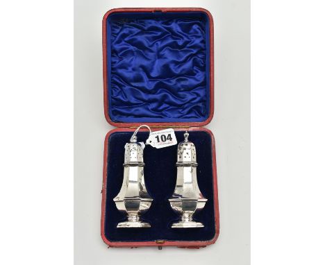 A PAIR OF CASED LATE VICTORIAN SALT AND PEPPER SHAKERS, a pair of octagonal baluster silver salt and pepper shakers, approxim