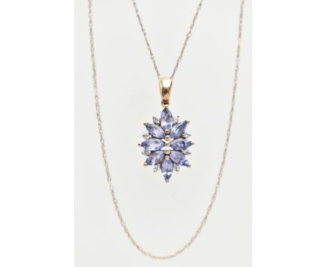 A 9CT GOLD TANZANITE AND DIAMOND PENDANT, designed as a cluster of marquise shape tanzanite with brilliant cut diamond detail