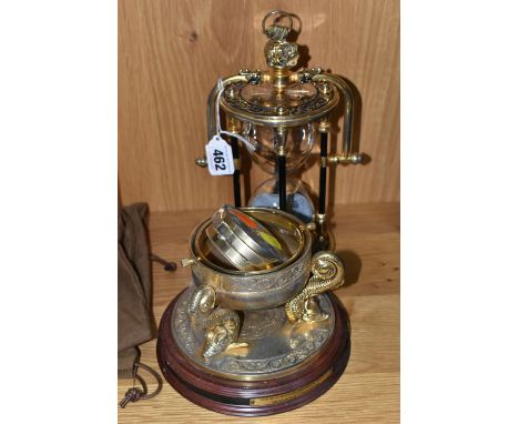 A NATIONAL MARITIME HISTORICAL SOCIETY REPRODUCTION MARITIME CHRONOMETER, AND A SIMILAR HOURGLASS, the modern maritime chrono