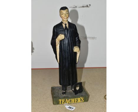 A TEACHER'S SCOTCH WHISKY ADVERTISING FIGURE, the Ruberoid figure in the form of a teacher in cap and gown, height 38cm (1 + 