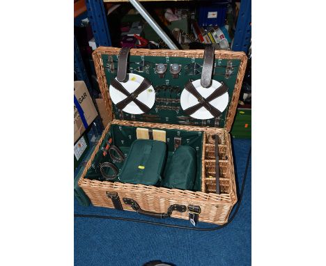 A WICKER PICNIC HAMPER/SET, a large hamper containing a set of four wine glasses, four plates, cutlery, cheese board, wine co