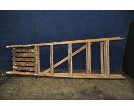 A VINTAGE WOODEN STEP LADDER with four rung to its 147cm height