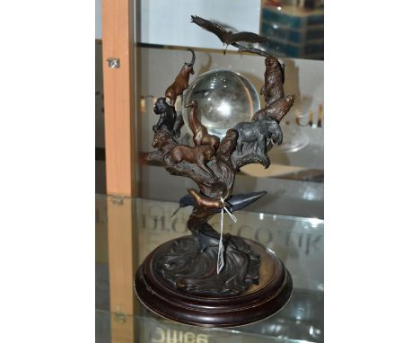 A BRONZE FRANKLIN MINT SCULPTURE 'GUARDIANS OF THE WORLD' CRYSTAL BALL, by Steven Lord, a central crystal ball is suspended b