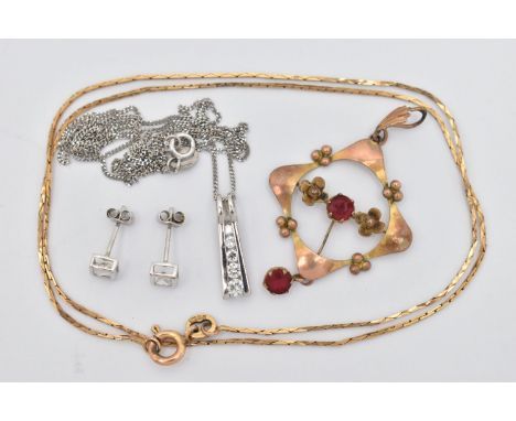 FOUR ITEMS OF JEWELLERY, to include a rose metal lavalier pendant, open work form with floral detail, set with a red paste ce