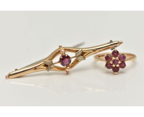 A 9CT GOLD BROOCH AND RING, a principally set round cut garnet, prong set in yellow gold, foliage detail to the brooch, appro