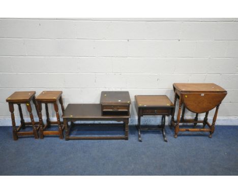 A SMALL OAK DROP LEAF TABLE, along with a mahogany drop leaf occasional table, an oak telephone table and a pair of beech sto