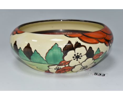 A CLARICE CLIFF FANTASQUE 'LIMBERLOST' PATTERN BOWL, shape 55, painted with flowers and trees in a landscape, the interior pa