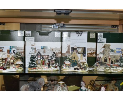 FOUR BOXED LILLIPUT LANE ILLUMINATED COTTAGES COLLECTION SNOW COTTAGES, comprising 'Christmas Shopping' L2649, 'The Three Kin