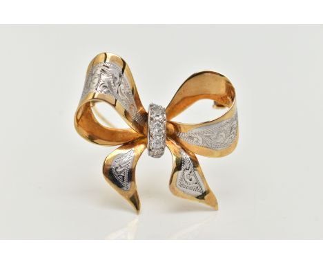 A BI COLOUR DIAMOND BROOCH, designed as a yellow metal bow with white metal and engraved detail, set with five round brillian