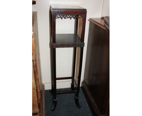 A mahogany jardiniere stand, rectangular top and under shelf with pierced and carved decoration, 22.5cm (TG)