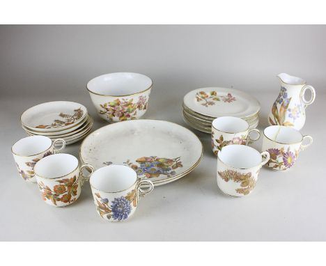 A Royal Worcester porcelain part tea service,  comprising six side plates, six cups and saucers, slop bowl, jug, and two larg