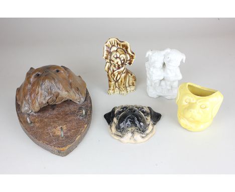 A Pug dog head key holder wall plaque, Shield shape with three hooks, 20cm, a ceramic wall plaque of a pug's head, a pug char