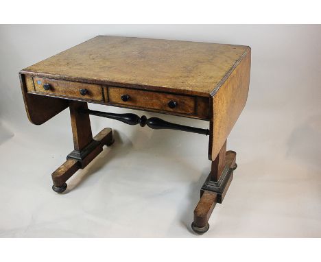 A Victorian walnut sofa table, with two frieze drawers and two opposing dummy drawers, ebonised trim, knob handles and stretc