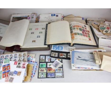A large collection of used 20th century stamps  mostly loose, some housed in two albums including some first day covers (TG)