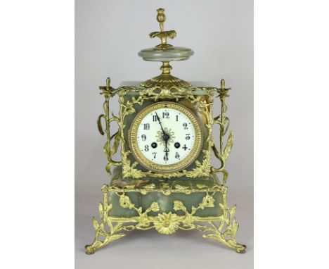 An ornate 19th century agate and ormolu mantel clock, the bevelled glass dial with Arabic numerals and gilt centre design, th