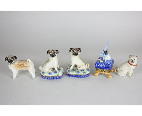A pair of Basil Matthews ceramic models of pug dogs,  seated on cushions with paper labels, 6cm, another of a standing pug, a