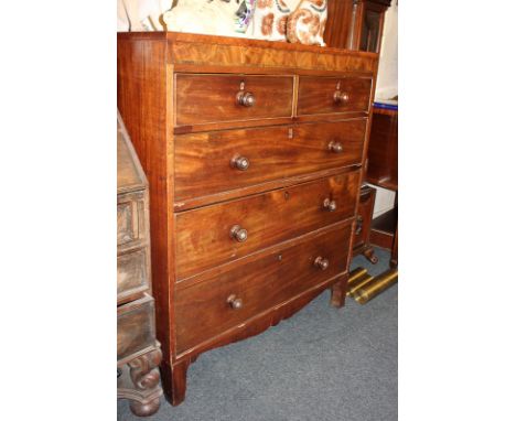 An inlaid mahogany chest of two short over three long drawers, on shaped bracket feet, 102cm