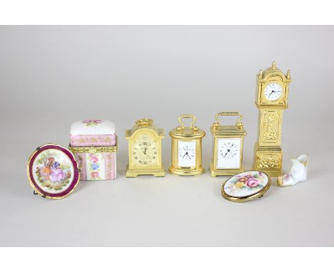 A small collection of miniature items including four quartz clocks, a Limoges plate and shoe, and a Royal Worcester floral br