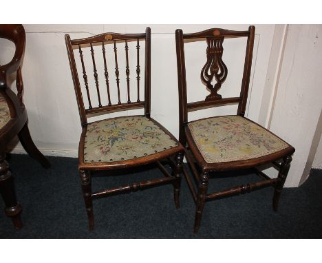 Two Edwardian low chairs, one with spindle back, the other with pierced splat, both with tapestry seats