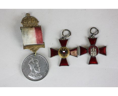 A German First World War Medal,  red enamel with central three turret castle, another similar medal (a/f) and an Edward VIII 