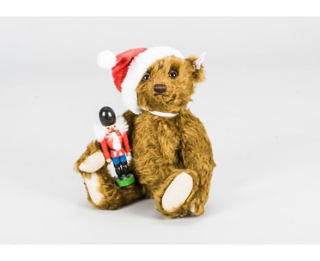 A Steiff limited edition Teddy Bear with nutcracker,  2441 of 3000, in original box with certificate, 2002