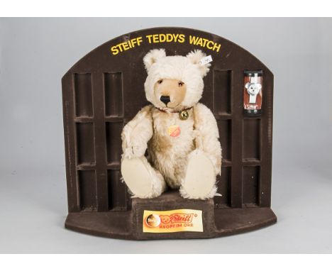 A Steiff Teddys Watch display 1991, with Watch Teddy, 1460 of 2000, brown flocked stand and one watch in original tube, with 