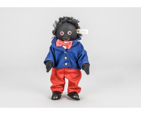 A Steiff limited edition Golly Boy,  1002 of 2000, in original box with certificate