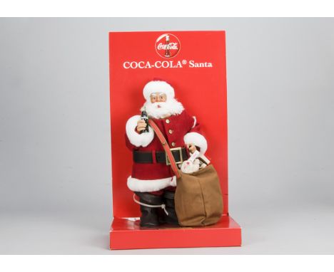 A Steiff limited edition Coco-Cola Santa,  4816 of 10,000, in original box with tag certificate, 1999