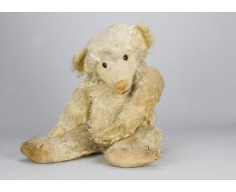 A rare large Cramer teddy bear late 1920s,  with long cream mohair, orange and black glass eyes, inset heart shaped mask, pro