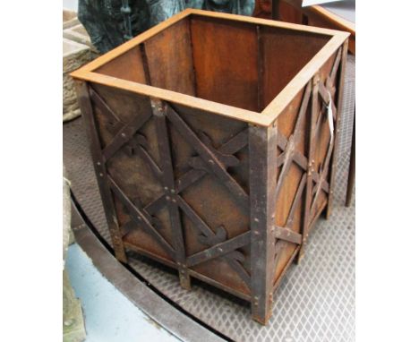 IRON PLANTER, with cruciform banding, 62cm x 75cm H.