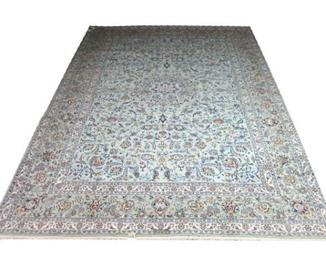 VERY FINE SIGNED KASHAN CARPET, 359cm x 271cm, central medallion with palmettes and vines on an oeuf de canard field.