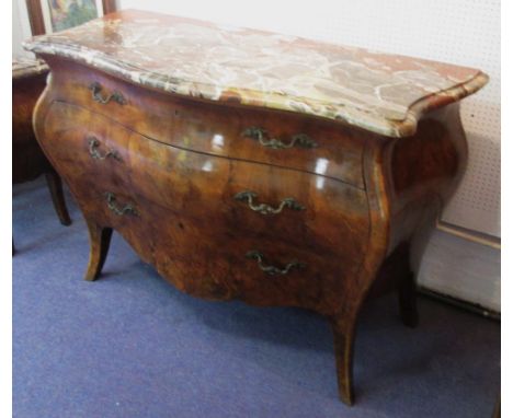 BOMBE COMMODE, late 19th/early 20th century Italian walnut with a serpentine shaped marble top over three long drawers, 140cm