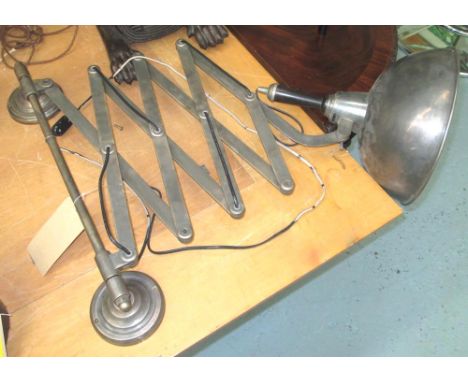 EXTENDING WALL LIGHT, of large proportions, having an extending arm with an old fashioned domed shade and a distressed metal 