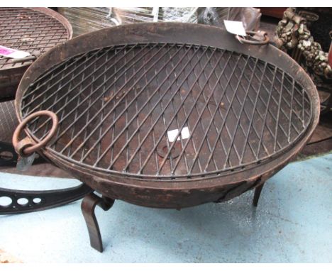 KADAI BOWL, 80cm diam of worked metal bowl with ring handles and grill.
