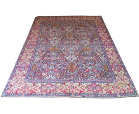 FINE ANTIQUE LAVER KERMAN CARPET, 365cm x 267cm, pendant medallion with four corner medallions within a corresponding lime bo