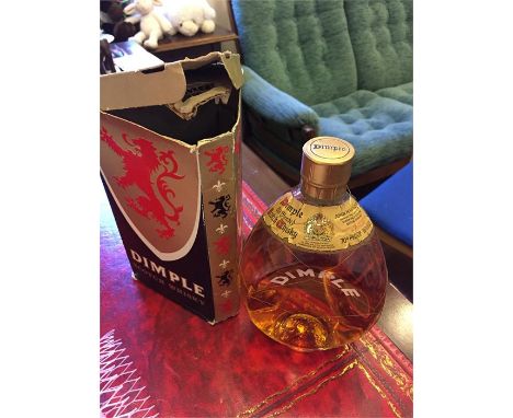 Boxed bottle of John Haig and co Ltd, Dimple Old Blended Scotch Whiskey with wire mesh bottle. 70 proof 26 2/3 FLOZS