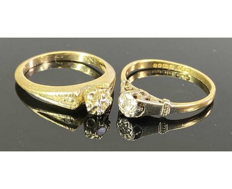 VINTAGE SOLITAIRE DIAMOND RINGS (2) - an 18ct gold and platinum example, the round cut stone within an illusion setting in a 