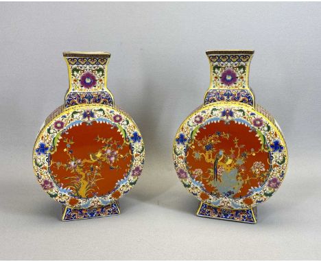 CHINESE PORCELAIN MOON FLASK VASES, A PAIR - 20th century, decorated enamels with central panels of birds with floral border,