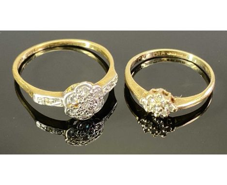 FLOWER HEAD CLUSTER DIAMOND RINGS (2) - the larger stamped '18ct plat' having nine small diamonds set to the platinum mount a