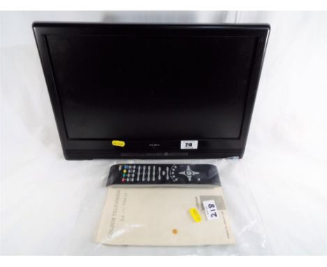 An LCD Alba 15 inch flat screen colour television with manual and remote control, model No. LCD W16HDF
