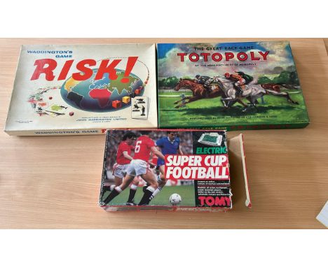 Three vintage games includes Super cup football, Risk and Totopoly 