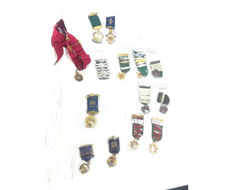 Selection of vintage medallions to include safe driving and Royal Order of Buffaloes etc 