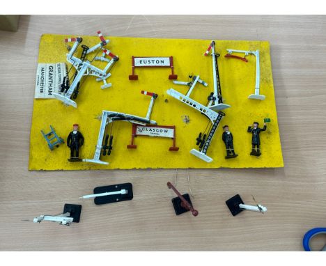 Selection of vintage cast railway model signals pieces, men, model station signs 