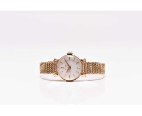 Omega: A lady's 9ct gold bracelet watch Reference: 194.739 Date: 1961 Movement: 17-jewel Cal.245 manual wind Dial: Champagne 